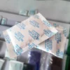 A customer needed multiple desiccant packs placed in a bag and attached to an instruction card to be used in another product. This package converted kit helped decrease overall labor and costs within the production line.